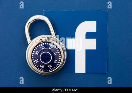 LONDON, UK - AUGUST 8th 2018: Facebook data security concept. A combination padlock with the facebook social media logo Stock Photo