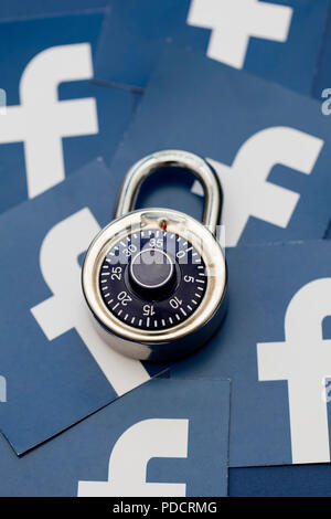 LONDON, UK - AUGUST 8th 2018: Facebook data security concept. A combination padlock with the facebook social media logo Stock Photo
