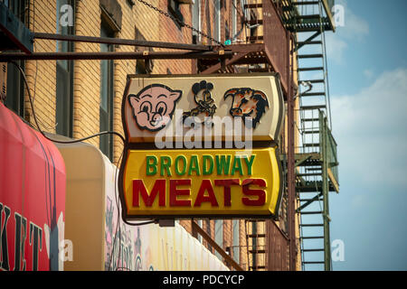 Butcher shop on Broadway under the elevated line in the Bushwick neighborhood of Brooklyn in New York on Sunday, August 5, 2018. As more and more hipsters move into the neighborhood the ethnicity of the area is changing.  (© Richard B. Levine) Stock Photo