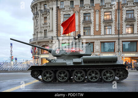 Legendary T-34 Tank with Waving Red Banner = Soviet T-34 tank with