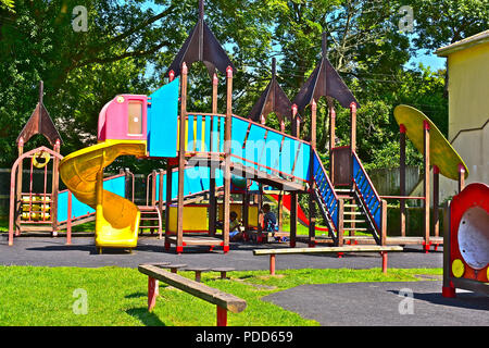 A colouful play area located at the rear of the popular Regency Hall Community Centre, Saundersfoot, Pembrokeshire Stock Photo