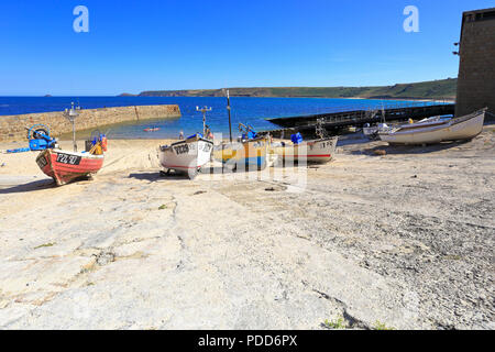 Fishing boats on the slipway in the harbour at Sennen Cove, Cornwall, England, UK. Stock Photo