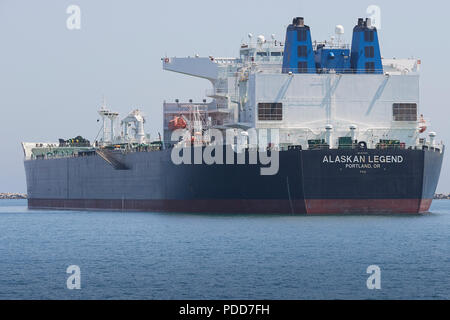 Stern View Of The Giant Supertanker (Crude Oil Tanker), ALASKAN LEGEND, At Anchor In The Port Of Long Beach, California, USA. Stock Photo