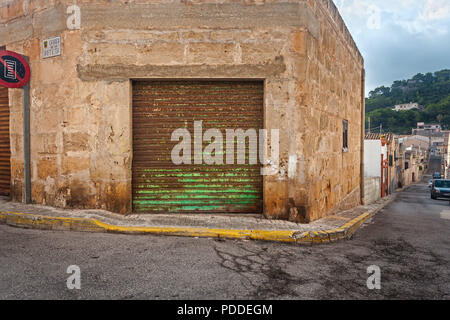 Colorful Weathered Barn frontal shot in surrounding - Mallorca Stock Photo