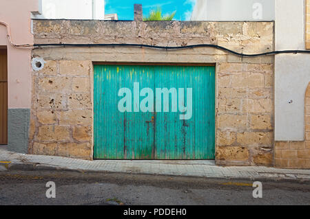 Colorful Weathered Barn frontal shot in surrounding - Mallorca Stock Photo