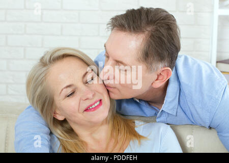 Beautiful Middle aged Couple portrait isolated on white. Stock Photo