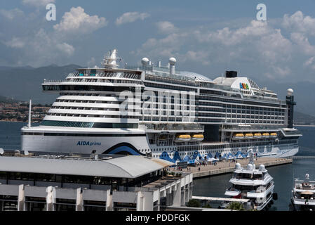 The AIDA prima cruise ship built by Mitsubishi Heavy Industries (MHI)in Japan for the German cruise operator AIDA Cruises in dock at Ajaccio port in A Stock Photo