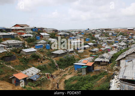 Cox’s Bazar, Bangladesh. A views of world’s largest Rohingya refugee camp in Ukhiya, Cox’s Bazar, Bangladesh on August 3, 2018. Monsoon rain causing flooding landslides in the world largest refugee camp in Bangladesh, where more than one million Rohingya people are living in bamboo and and tarpaulin sheet shelters. Over half a million Rohingya refugees from Myanmar’s Rakhine state, have fled into Bangladesh since August 25, 2017 according to UN. The Myanmar military's latest campaign against the Rohingyas began after the attack on multiple police posts in Rakhine state. Stock Photo