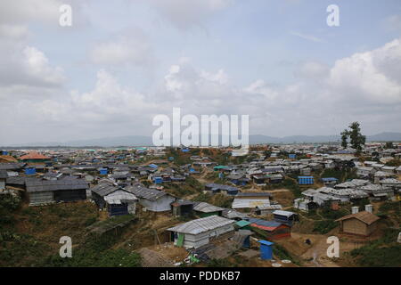 Cox’s Bazar, Bangladesh. A views of world’s largest Rohingya refugee camp in Ukhiya, Cox’s Bazar, Bangladesh on August 3, 2018. Monsoon rain causing flooding landslides in the world largest refugee camp in Bangladesh, where more than one million Rohingya people are living in bamboo and and tarpaulin sheet shelters. Over half a million Rohingya refugees from Myanmar’s Rakhine state, have fled into Bangladesh since August 25, 2017 according to UN. The Myanmar military's latest campaign against the Rohingyas began after the attack on multiple police posts in Rakhine state. Stock Photo