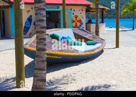 LABADEE, HAITI - MAY 01, 2018: The wooden bench at coast, Labadee, Haiti Stock Photo