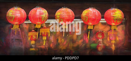 Sightseeing around San Francisco's Chinatown, colorful orange lanterns were nearly everywhere. These five hung in front of one particular Chinese tour Stock Photo