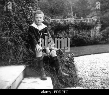 Childhood portrait of C.S. Lewis (Nov. 29, 1898-Nov. 22, 1963), British novelist, academic, medievalist, literary critic, lay theologian, broadcaster, and Christian apologist. Lewis, who held academic positions at both Oxford University and Cambridge University, had as a child been a pupil at Campbell College in Belfast, Ireland (the city where he was born) from September to November 1910. The lampost on the school grounds is believed to have formed part of his inspiration for 'The Lion, the Witch and the Wardrobe' in his popular Chronicles of Narnia series. Stock Photo