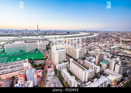 Business and culture concept - panoramic modern city skyline bird eye aerial view with tokyo skytree under dramatic sunset glow and beautiful cloudy s Stock Photo