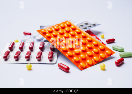 Photo of blisters with pills on white background Stock Photo
