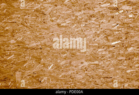 Fiberboard. Compressed light brown wooden texture Stock Photo