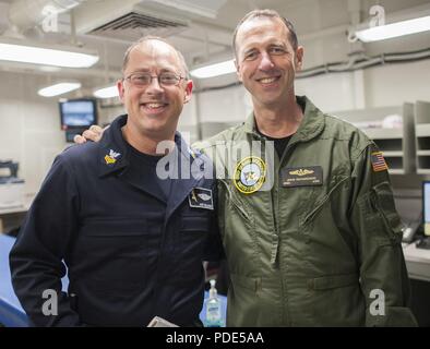 ATLANTIC OCEAN (May 14, 2018) Chief of Naval Operations Adm. John Richardson, right, poses for a Stock Photo