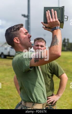 U.S. Marine Corps Cpl. Kyler Goeglein, left, and U.S. Marine Corps Cpl ...