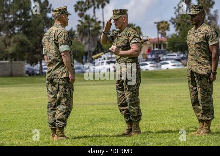 Sgt. Maj. James K. Porterfield, right, receives a Legion of Merit