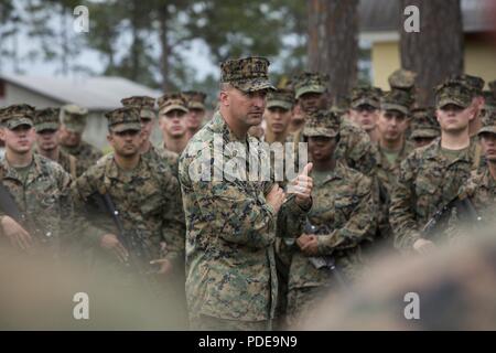 U.S. Marine Corps Col. Aaron Brunk, left, Joint Exercise Support Group ...