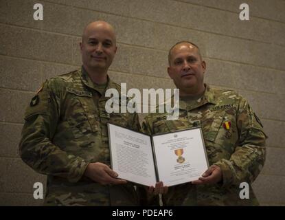 Today we said farewell to Sgt. Maj. Gary McCann, who after 32 total years of service finally laced ‘em up for the last time. During a ceremony that included his wife and three children, McCann was lauded by Col. Stephen Schemenauer, brigade commander, and presented the following: commander’s award for public service, certificate of commendation from the Office of the Governor, Minnesota Medal for Merit and a special plaque from the brigade. “I know you for your candor, and how you care for Soldiers over all,” said Schemenauer. Stock Photo