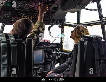 https://l450v.alamy.com/450v/pdeebn/us-air-force-capt-michael-catherman-left-a-pilot-with-the-193rd-special-operations-squadron-pennsylvania-air-national-guard-explains-the-various-controls-and-instruments-on-board-an-ec-130sj-super-j-aircraft-to-lori-beaver-a-guidance-counselor-from-lower-dauphin-high-school-may-16-2018-at-the-193rd-special-operations-wing-in-middletown-pennsylvania-beaver-and-three-other-guidance-counselors-from-the-local-area-visited-the-193rd-sow-to-gain-insight-on-the-ang-to-further-their-knowledge-when-providing-counsel-to-their-students-pdeebn.jpg