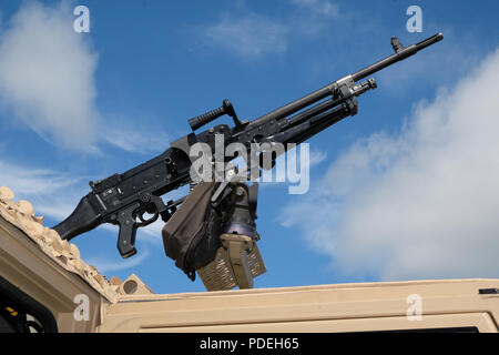 A general-purpose machine gun is an air-cooled, fully automatic weapon that can be adapted to light machine gun and medium machine gun roles. Stock Photo