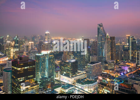 Modern building in Bangkok business district at Bangkok city with skyline in night, Thailand. Stock Photo