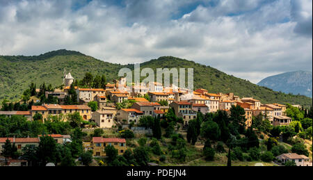 The village and Moulin d'Omer of Cucugnan,  famous book by Alphonse Daudet's 'Les lettres de mon moulin', Aude, Occitanie, France Stock Photo