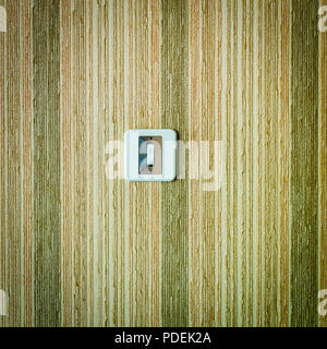 Close-up of a old fashioned light switch Stock Photo