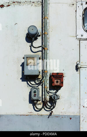 The power button and switch electricity with inscriptions on old wall Stock Photo