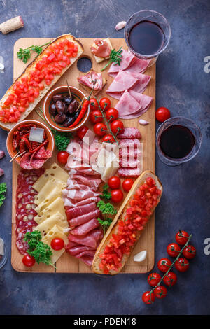 Traditional spanish tapas or italian antipasti Stock Photo