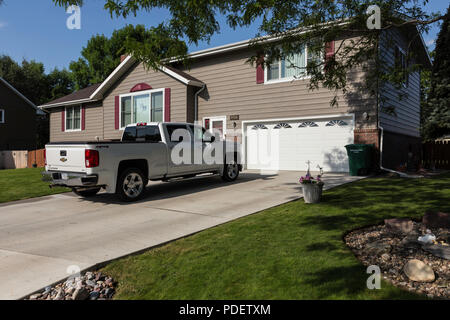 Residential House Exterior in Middle Class Neighborhood, MT, USA Stock Photo