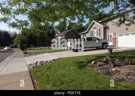 Residential House Exterior in Middle Class Neighborhood, MT, USA Stock Photo