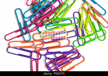 Colored paper clips on white backgound Stock Photo