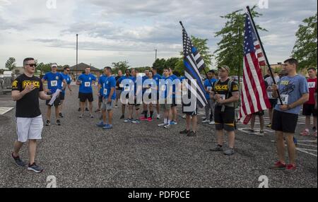 The 375th Security Forces Squadron held the Police Memorial 5K Fun Run at Scott Air Force base, Ill., May 15, 2018. The event was held as part of National Police Week to pay tribute to officers who have died or have been injured in the line of duty. Other events planned for the week include a Top Gun Shooting Competition, golf scramble, softball tournament and K-9 competition. Stock Photo