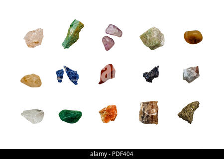 various colored raw gemstones fragments on white background Stock Photo