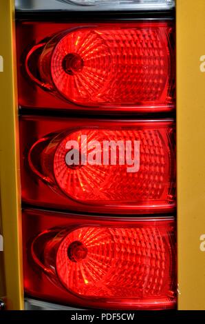 Back, tail or rear lights (close up) on a large Volvo bus. Stock Photo