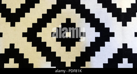 Traditional Uzbek pattern on woven linen carpet, background Stock Photo