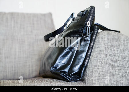 Zip on a leather bag. Close up Stock Photo