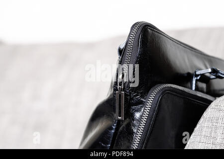 Zip on a leather bag. Close up Stock Photo