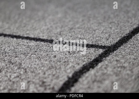 Stack gray bath mats bath mats Stack, stacked on top of each other. Terry mats. Stock Photo