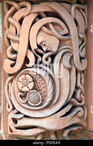 Exterior terracotta relief at the entrance to Watts Cemetery Chapel in Compton, Surrey Stock Photo