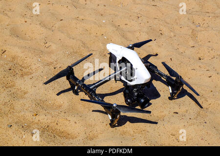 Headless Quadcopter Drone with Action Camera Isolated on White Background. Aerial Quad Copter with Digital Camera. Flying Remote Control Air Drone Stock Photo