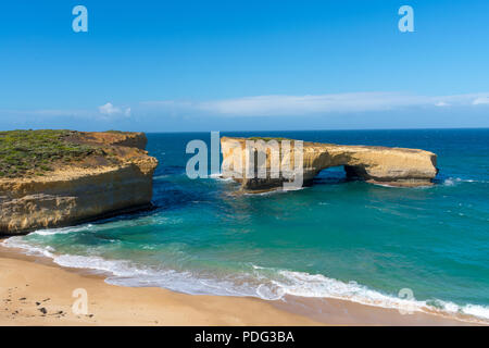 A photo of London bridge on the Great Ocean Road taken during a summer day Stock Photo