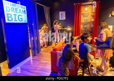 Visitors to an Ikea pop-up branding event in Soho in New York on Friday, August 3, 2018 attempt to collect points by scanning items with their smartphones in the demonstration rooms. The visitors were treated to Ikea products upon completion and on top of that... Swedish Meatballs were served. (© Richard B. Levine) Stock Photo