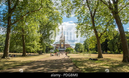 The Gothic Revival Styled Albert Memorial in Kensington Gardens with the Royal Albert (Concert) Hall behind, South Kensington, London, England Stock Photo