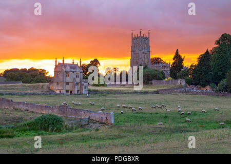 East Banqueting House of Old Campden House and St James' church in the coneygree field at sunset, Chipping Campden, Cotswolds, Gloucestershire Stock Photo