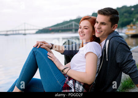 Nice joyful coupe enjoying the view Romantic date. Stock Photo