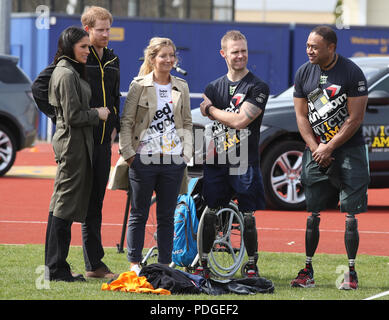 Prince Harry and Ms Meghan Markle as they attend the UK Team Invictus Games trials held at Bath University Sports training village in Somerset. Stock Photo