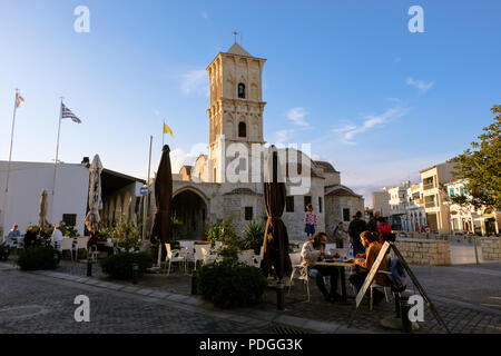Larnaca, CYPRUS - January 2 2018: People eating in the centre of Larnaca, near the Saint Lazarus Church. LARNACA, January 2 2018 Stock Photo